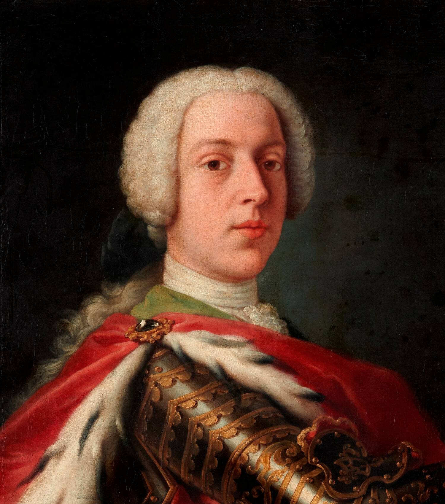 A half-portrait of a young 18th-century prince. He wears a white wig and a rich red cape, lined with fur. He has golden armour on his arm.
