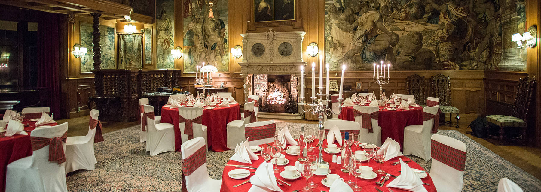 Interior of Fyvie Castle with tables laid for an occasion