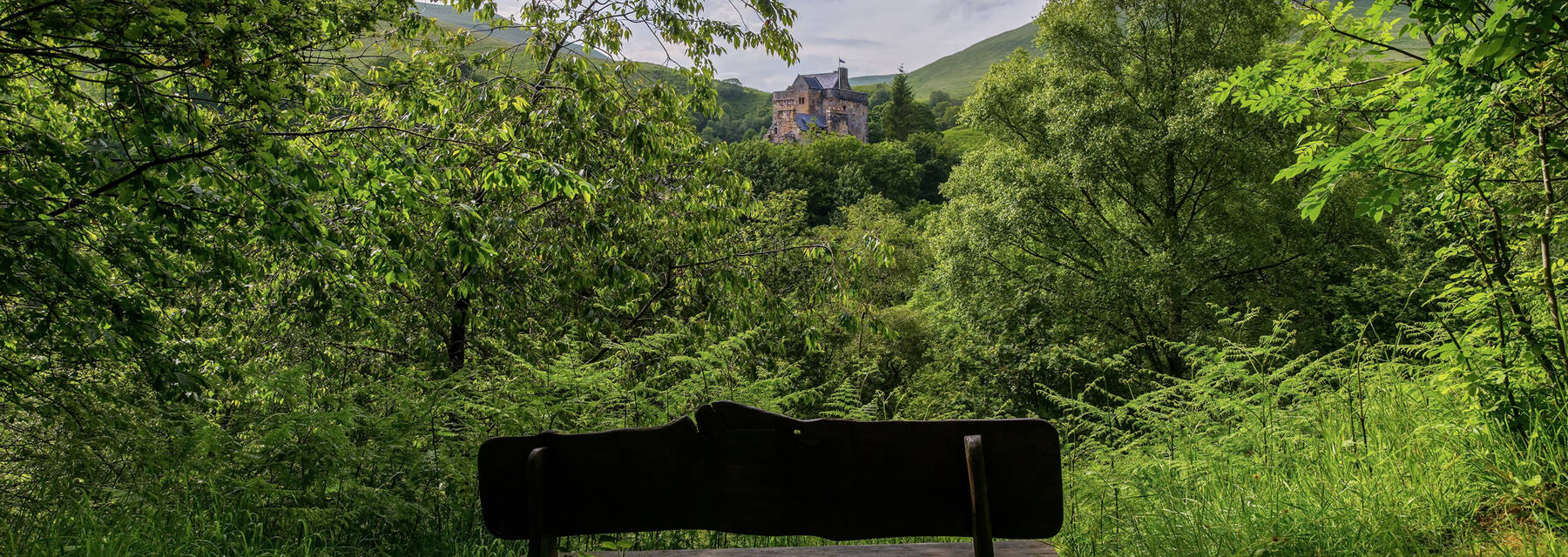 Dollar Glen with bench and Castle Campbell in distance