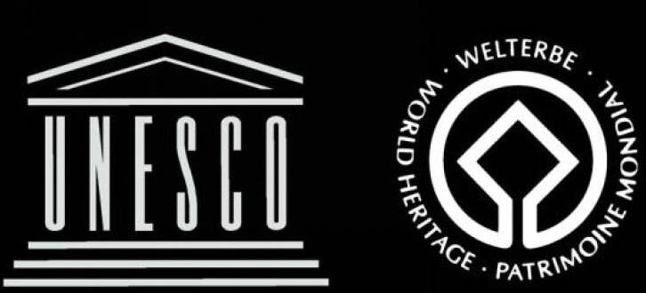 Unesco cultural and natural heritage status logos.