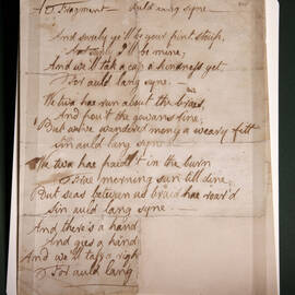  A fragment of a manuscript for Burns’s ’Auld Lang Syne’, written in his handwriting. The bottom right corner has been torn.
