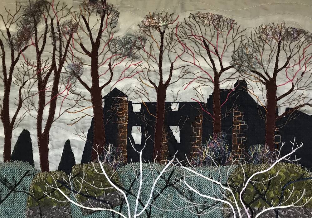 A painting of a silhouetted Falkland Palace, with bare wintry trees standing in front. Parts of the painting have been stitched to add more texture to the piece.