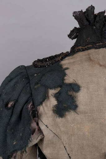 A bodice trimmed with lace