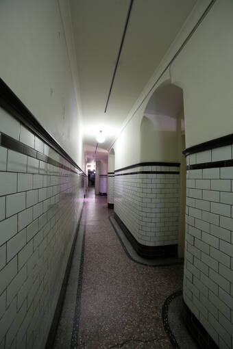 The long tiled Servants’ Corridor at Pollok House