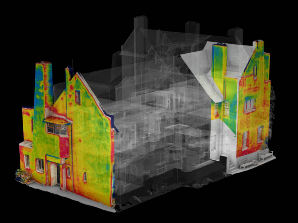 A 3D tech scan of the Hill House, with a thermo-graphic scan superimposed on the two gable ends. The thermographic scan shows mostly yellow and green areas on the walls, but the chimney stacks are blue.