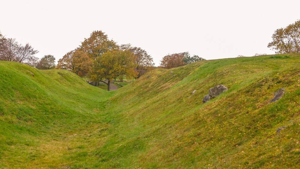 A large turf-covered ditch, which is part of the Antonine Wall. A UNESCO World Heritage Site.
