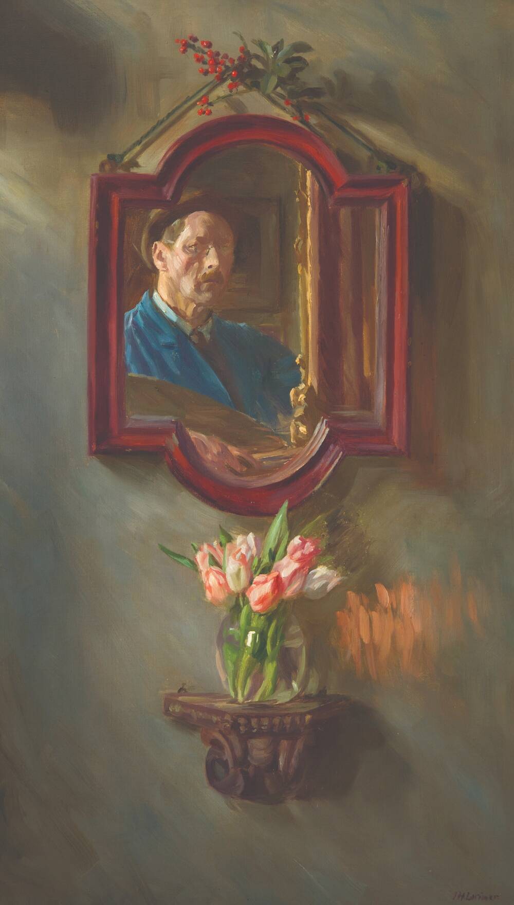 Self portrait of a man reflected in a small mirror on a wall, with a bunch of tulips on a small shelf below.